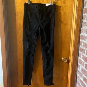 Woman’s American Eagle Outfitters Black Distressed Skinny  Jeggings 2